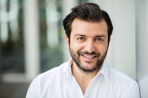 elegant man in white shirt outside