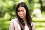 Asian Beauty. Outdoor Portrait Of Smiling Beautiful Korean Girl In Summer Park